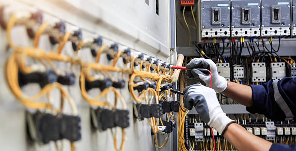 Professional Electrician technician working in Calverton Park, MO